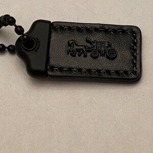 Authentic COACH Horse & Carriage Handbag Hang Tag. Black. 1-3/4"x3/4" Brand New